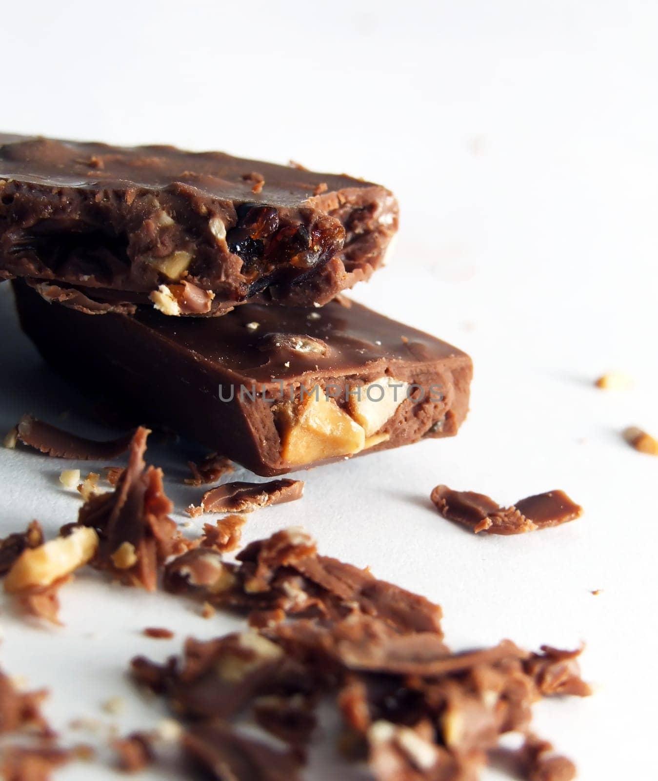crumbled chocolate with hazelnuts over white
