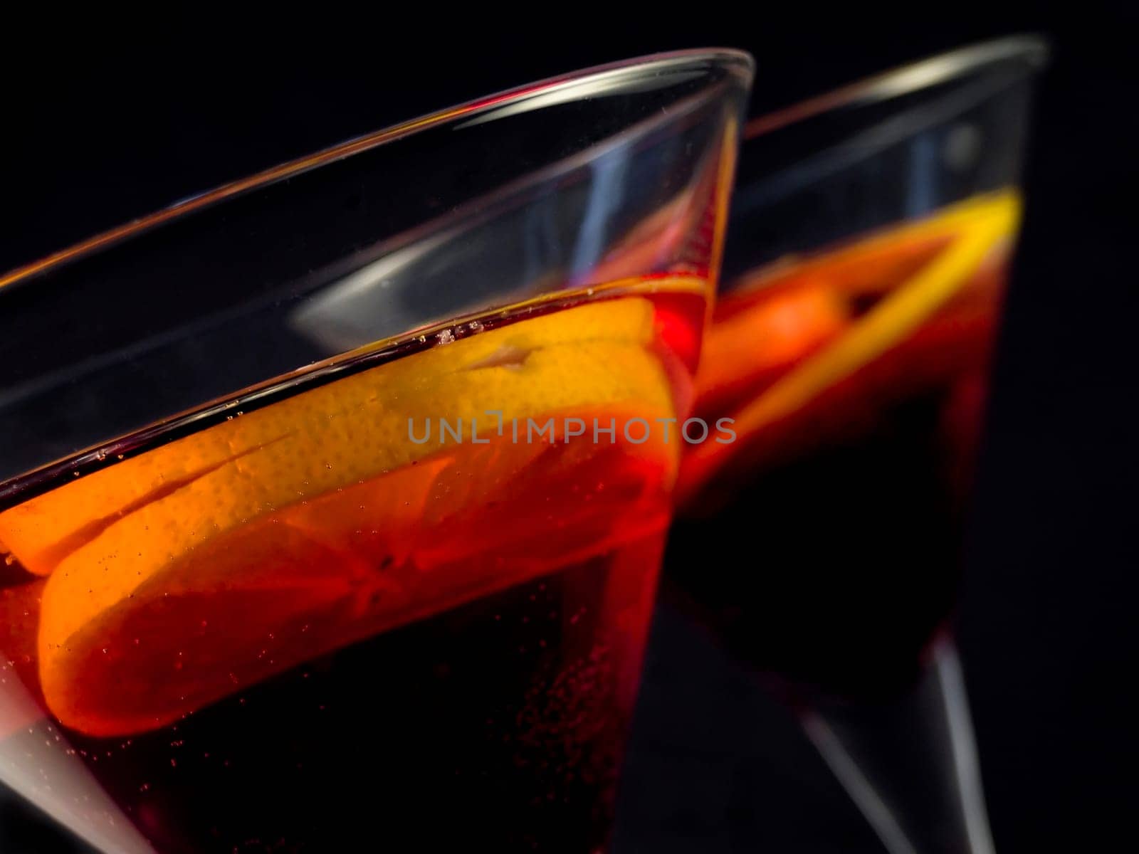 cocktail with lemon over black