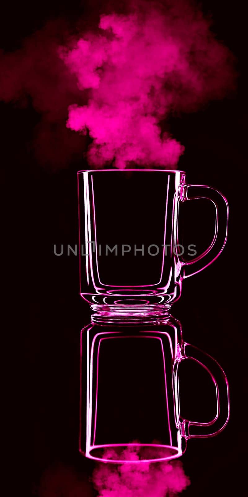 Just a glass on a black background with a reflection. Red color, with steam. Isolated.