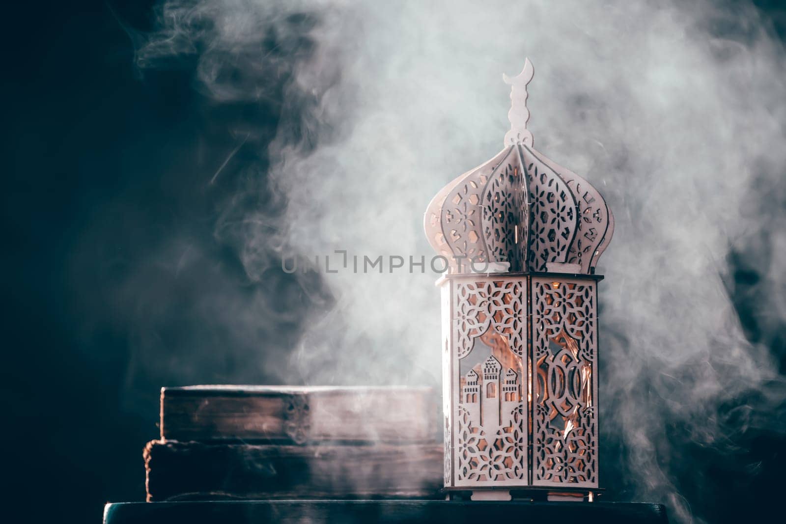 Ornamental Arabic lantern with with Holy Quran. Festive greeting card for Muslim holy month Ramadan Kareem.