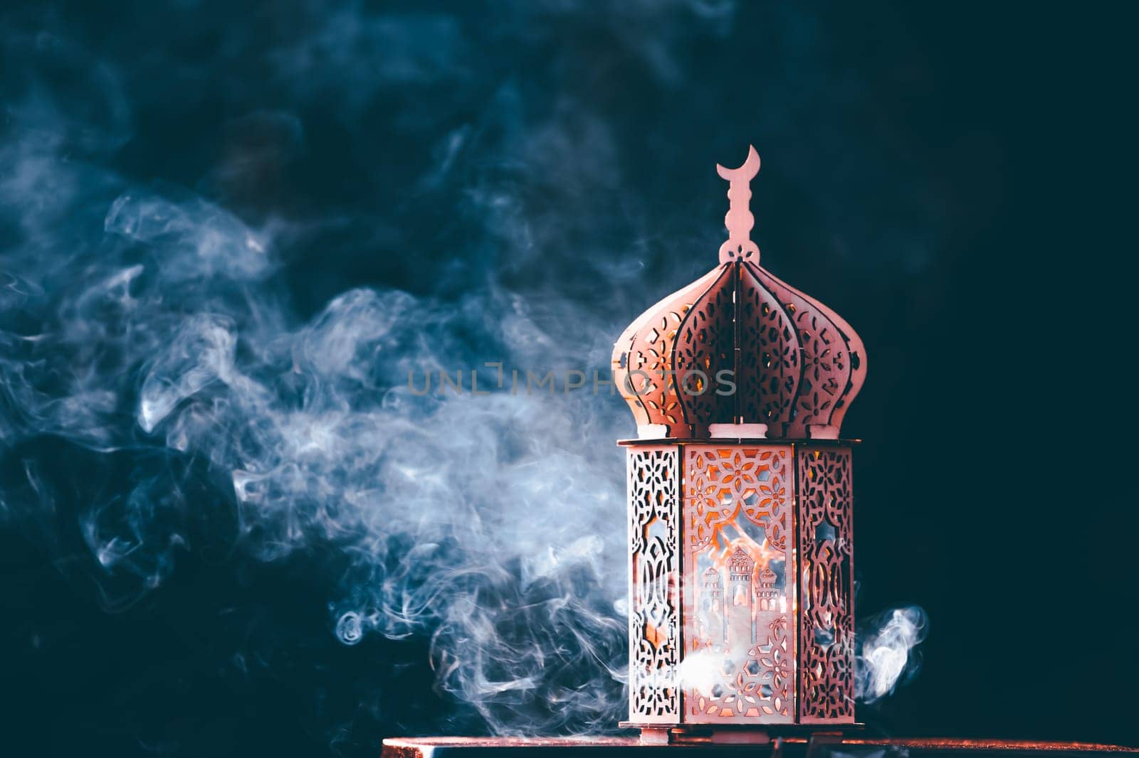 Ornamental Arabic lantern with with Holy Quran. Festive greeting card for Muslim holy month Ramadan Kareem.