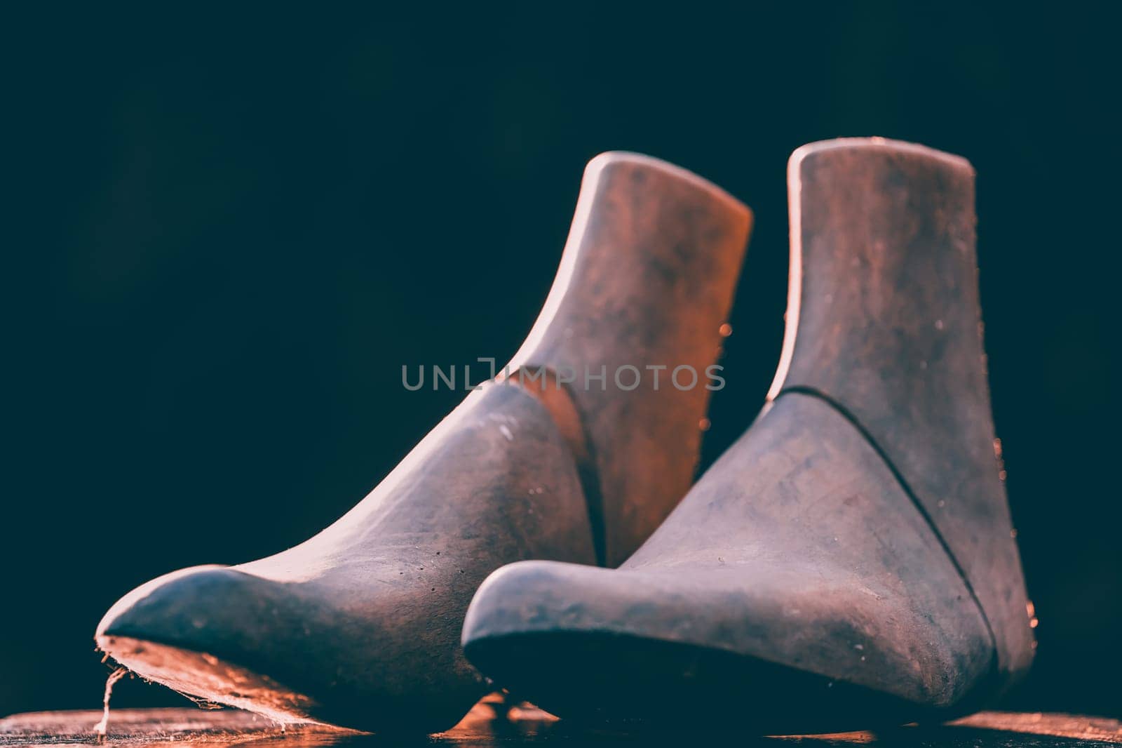 Vintage wooden mannequin foot - retro styled fashion background