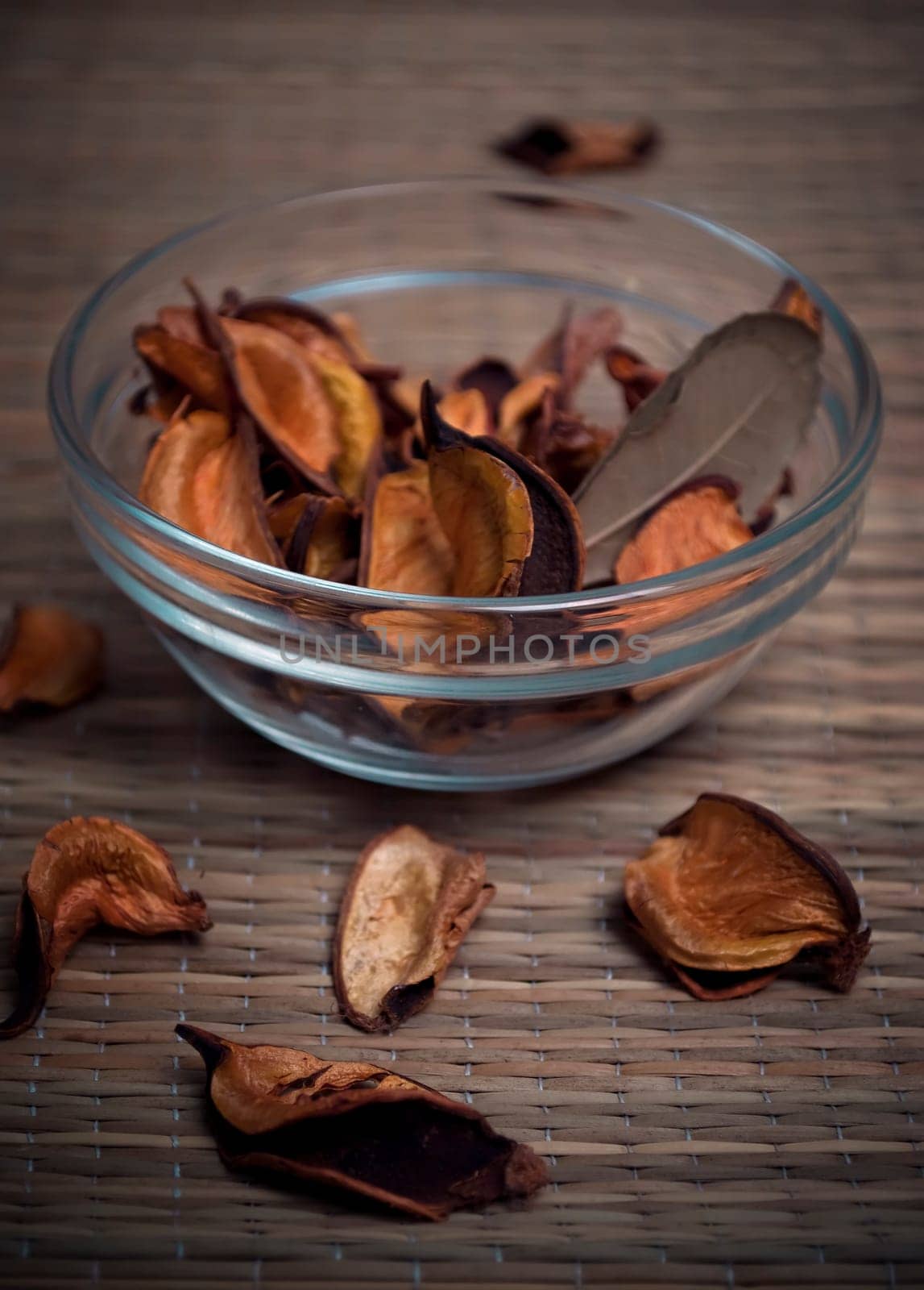 Zen-like composition with bowl of scented potpourri