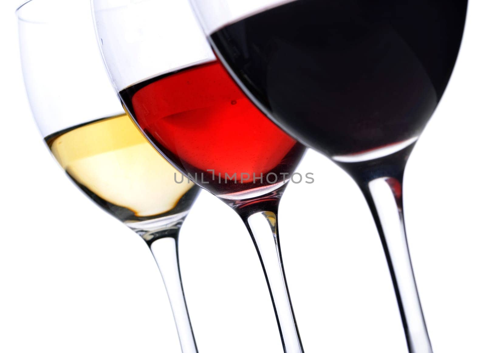 Three glass of wine over white background