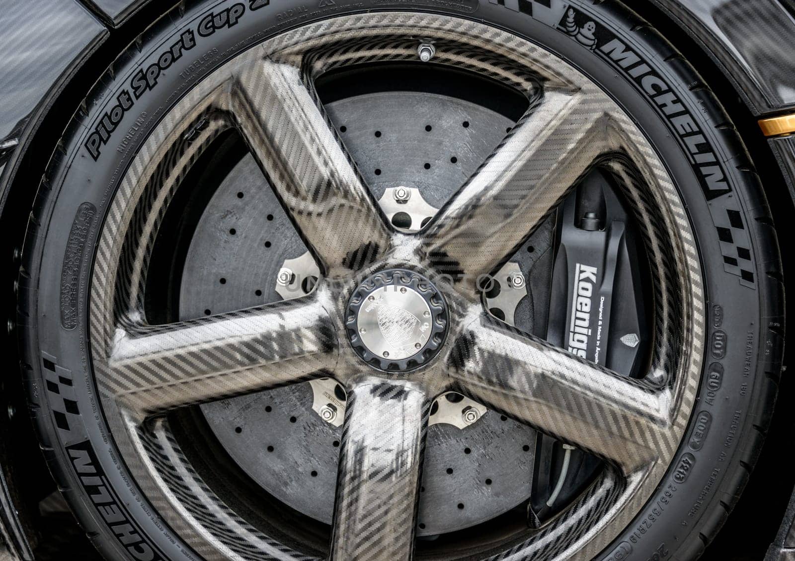 LONDON, UK - CIRCA JUNE 2014: Koenigsegg One:1 carbon fibre wheel, disk brake and Michelin tyre.