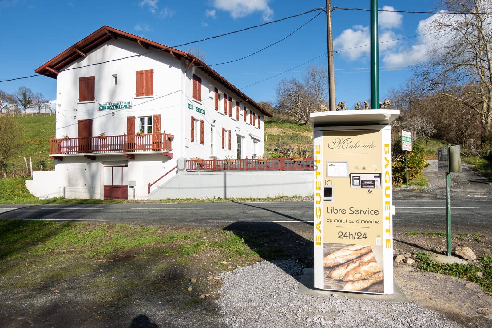SUHESCUN, FRANCE - CIRCA DECEMBER 2020: Minhondo Bakery baguette vending machine.