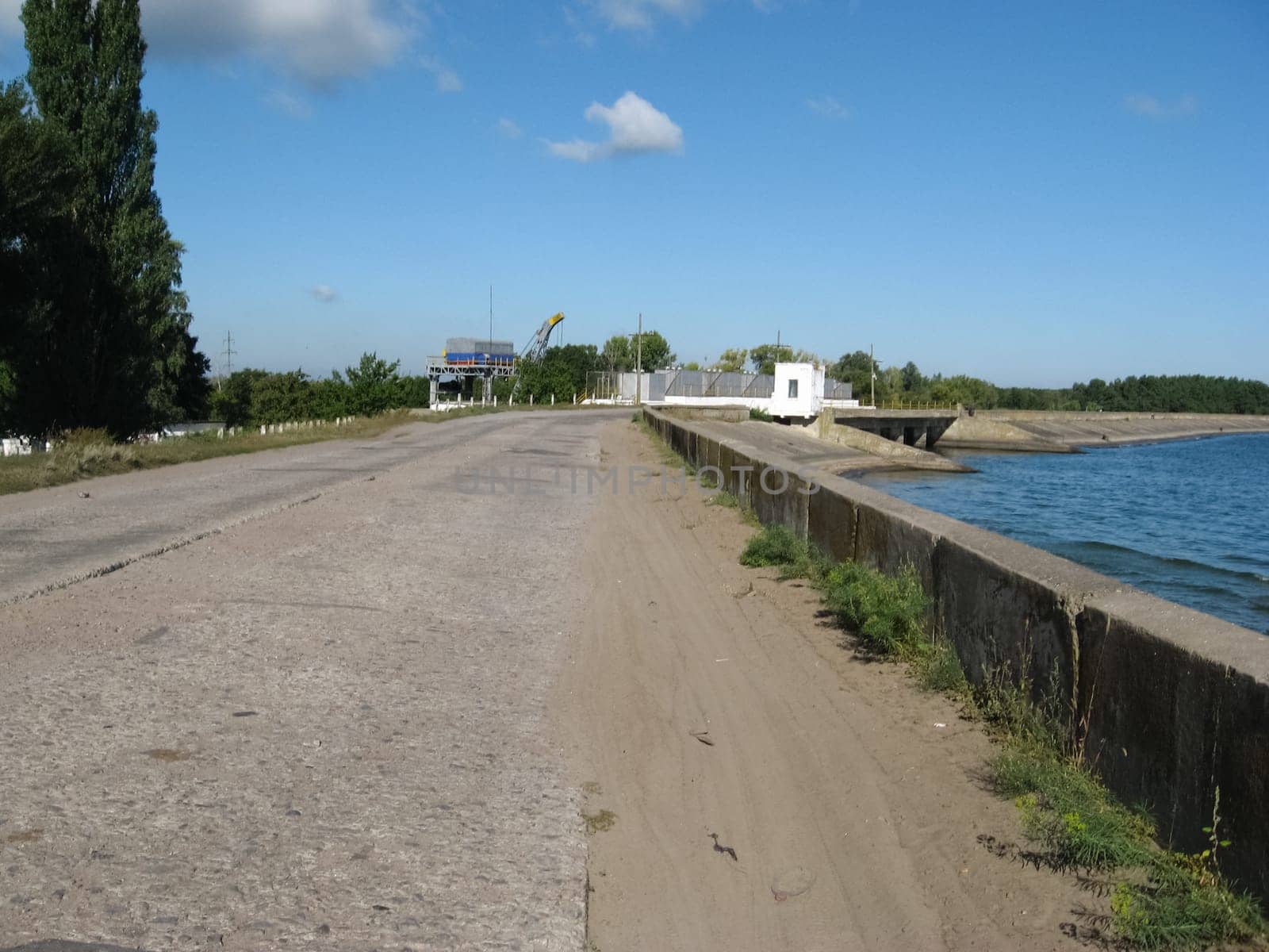The road from the slabs along the reservoir. Old Reservoir Beach. Chyhyryn Nuclear Power Plant
