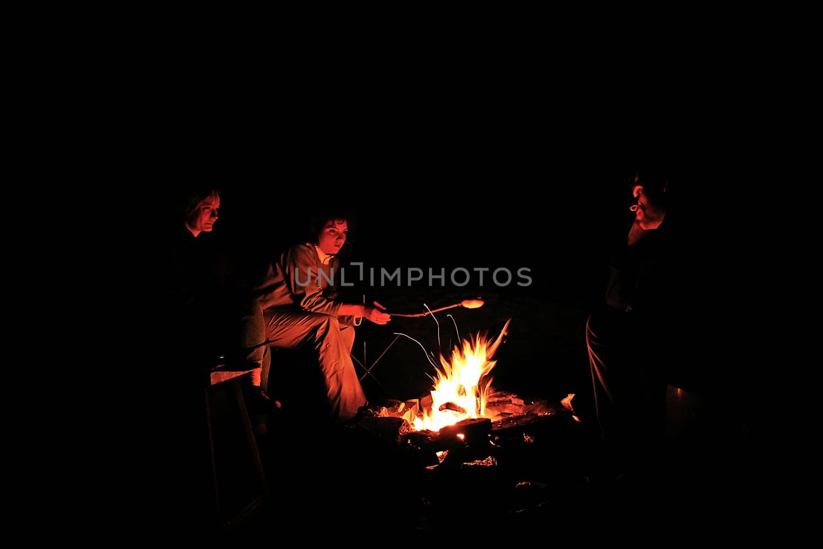 summer evening at the campfire