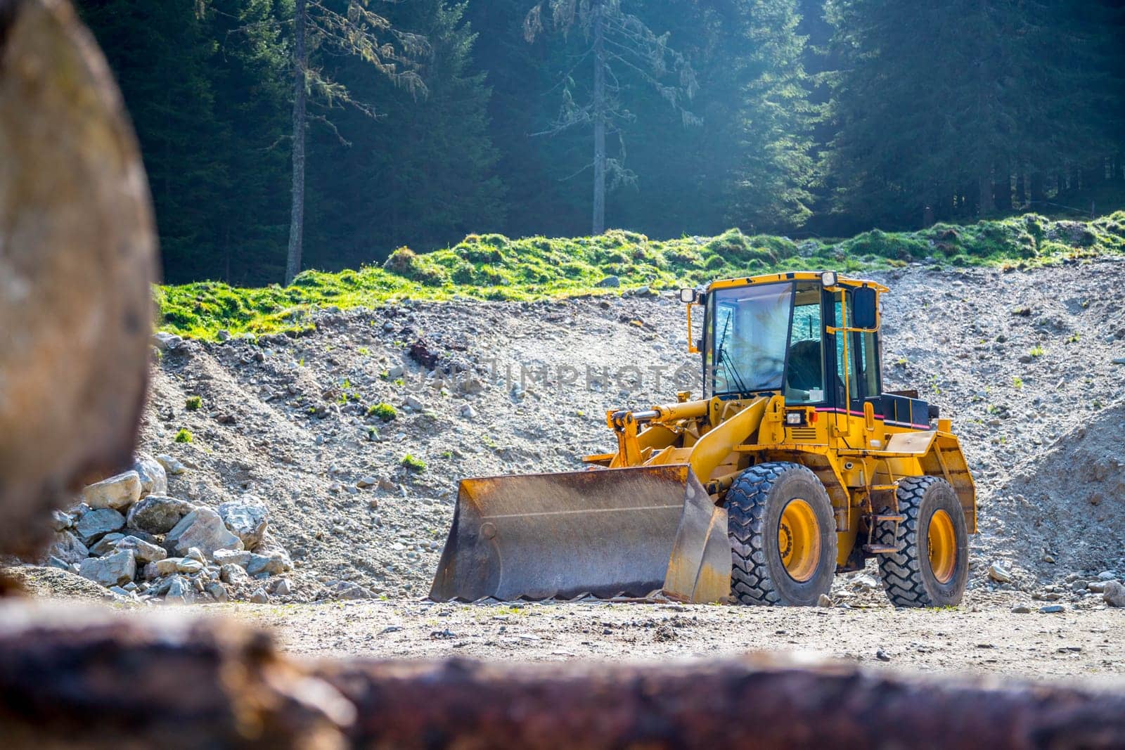 Wheel loader excavator is parking in a quarry