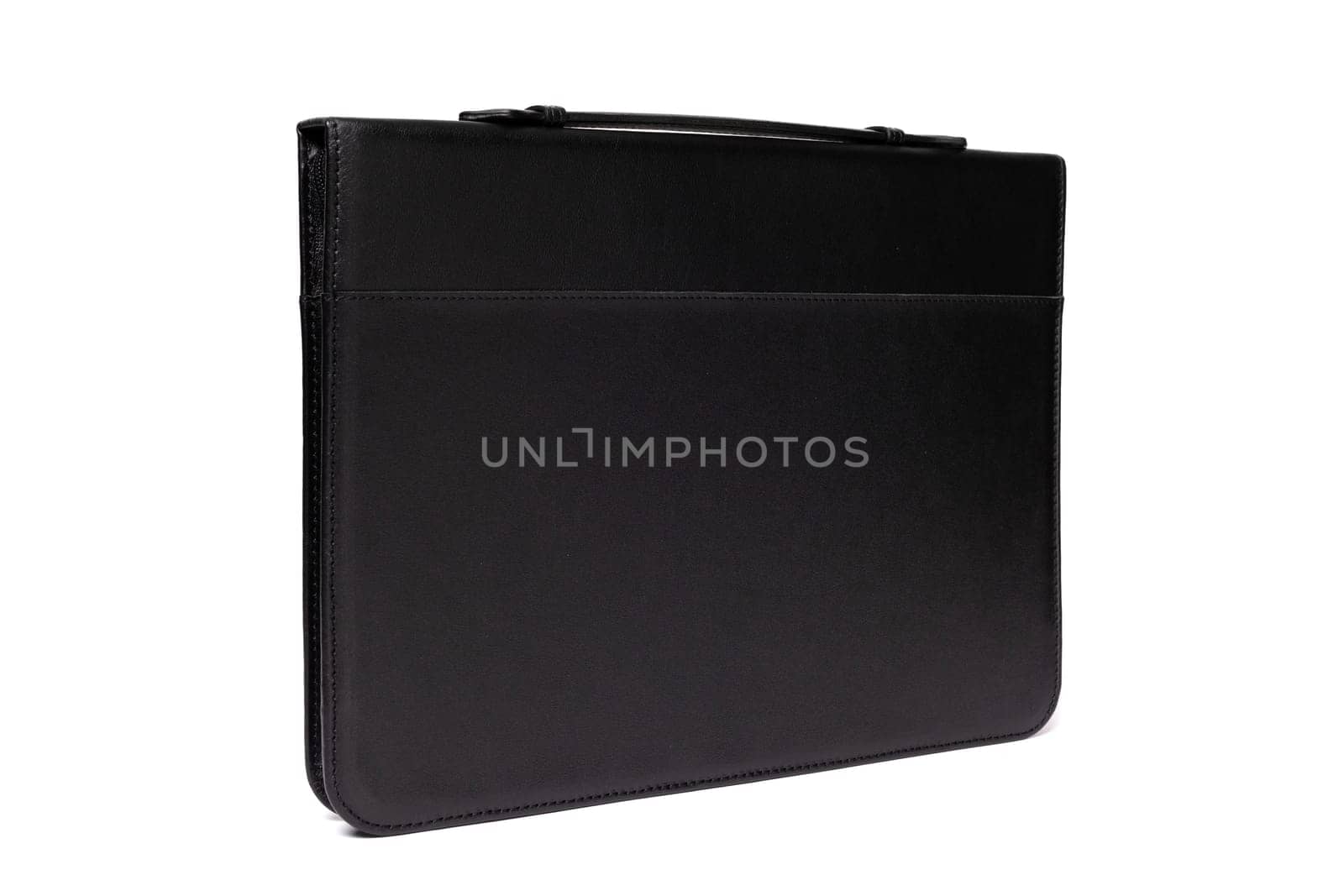 This black leather briefcase features a minimalist design, ideal for carrying documents and laptops. Its sturdy handle ensures comfort during daily commutes and meetings.