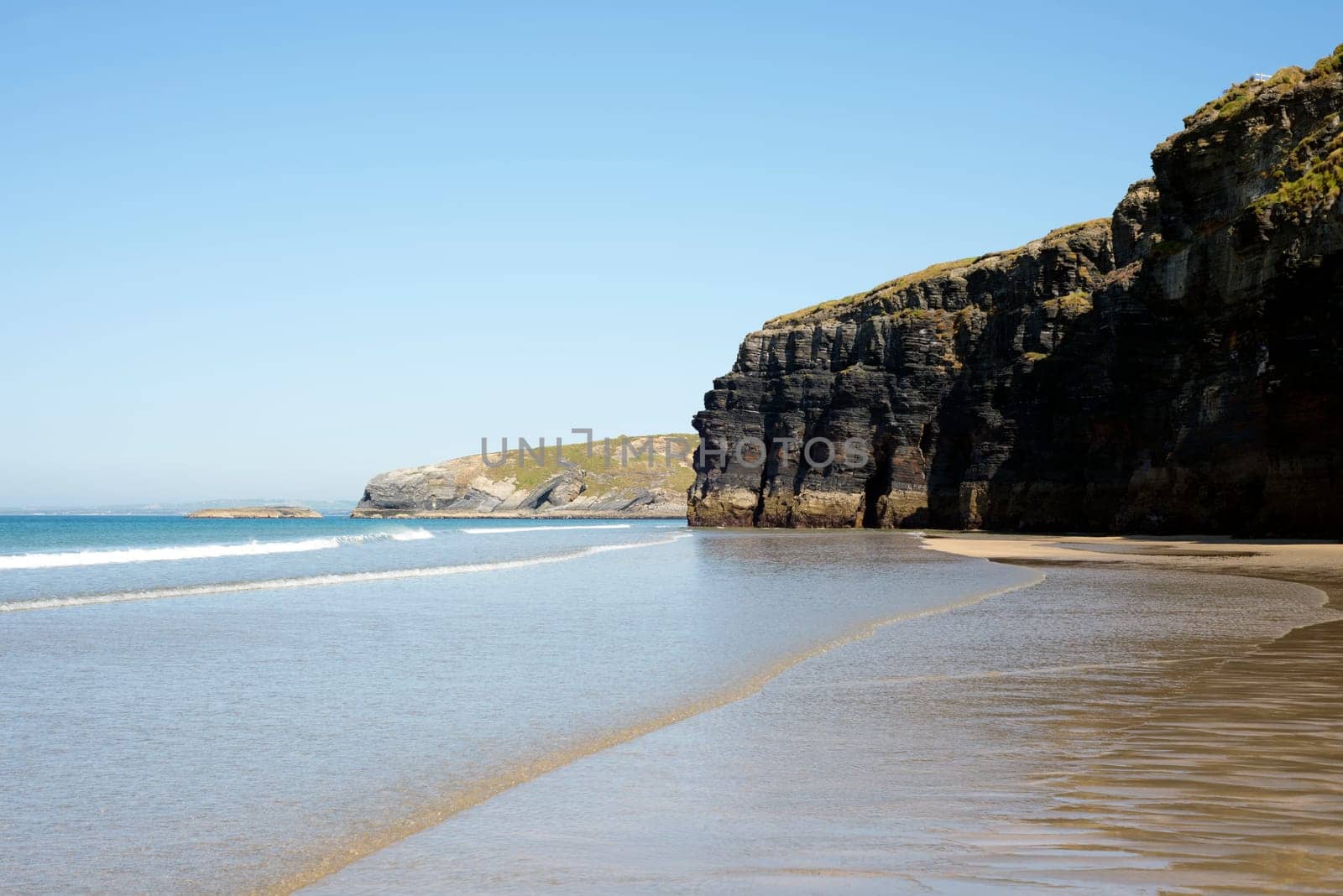 ballybunion beach and cliffs on the wild atlantic way at low tide