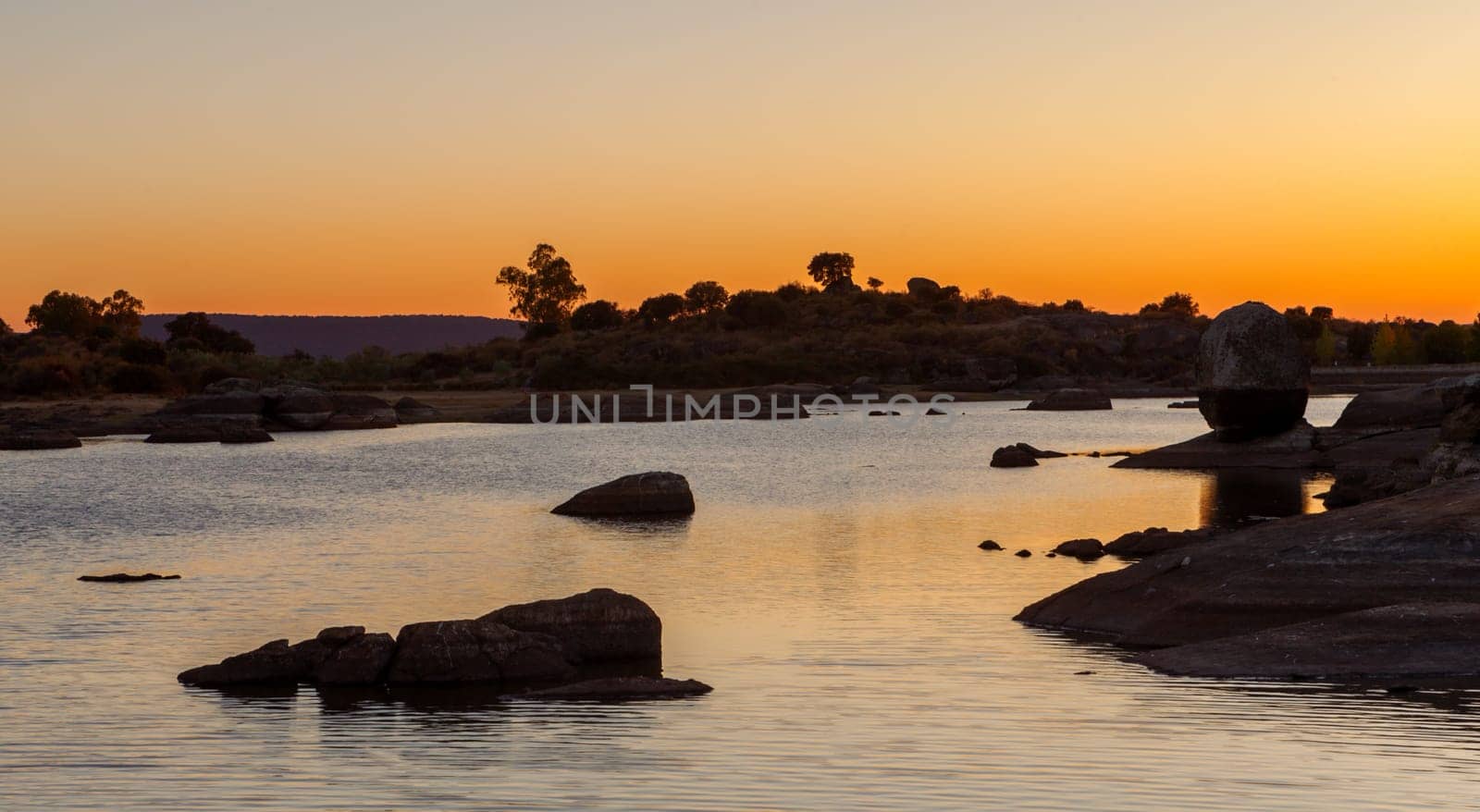 Beautiful landscape in a lake during the sunset with amazing colors