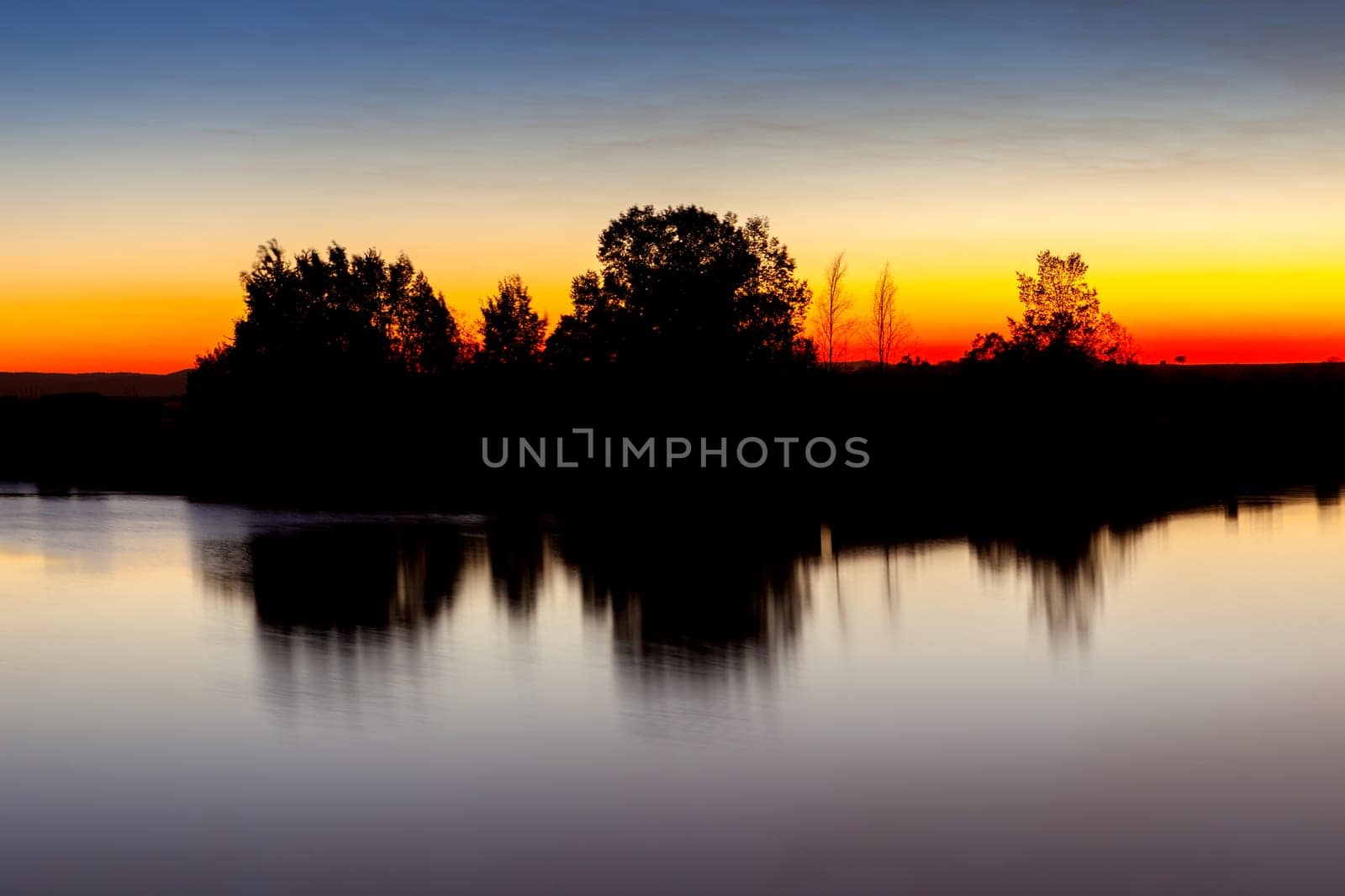 Beautiful landscape in a lake during the sunset with amazing colors