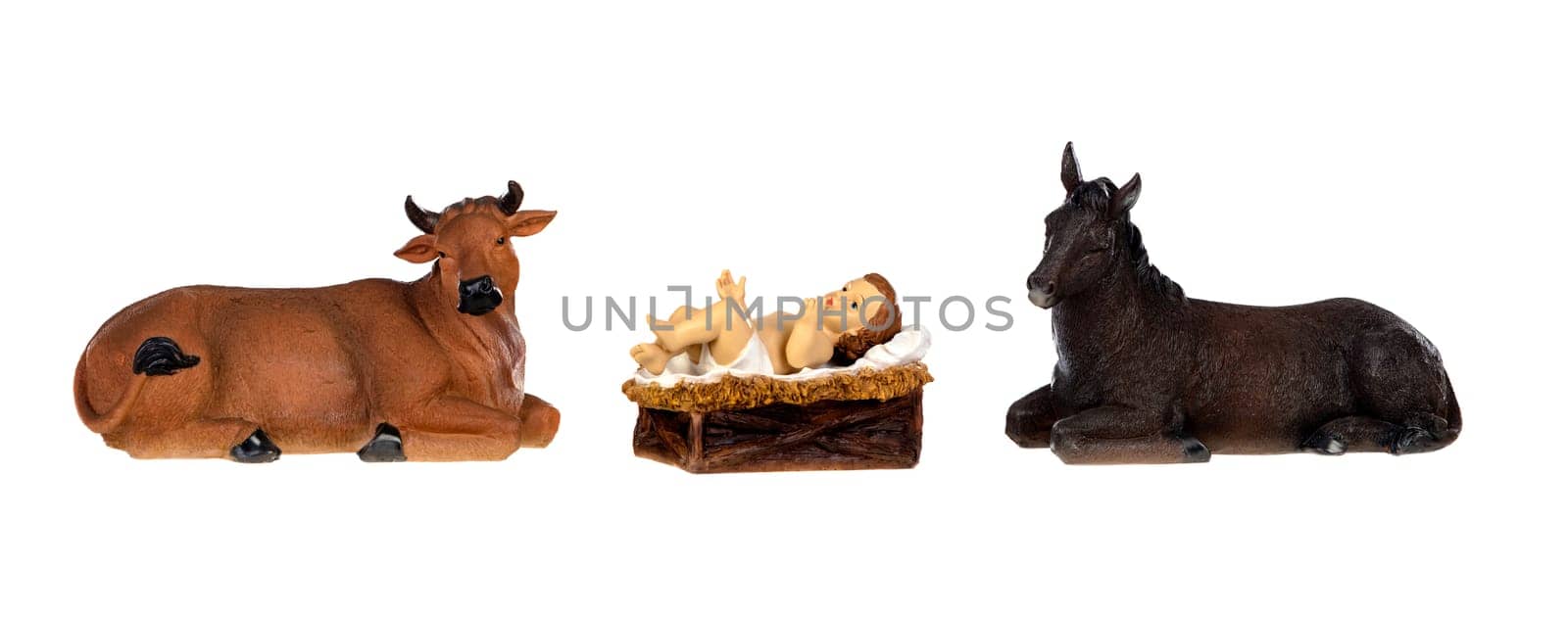 The Baby Jesus in the manger with the ox and the mule, isolated on white background