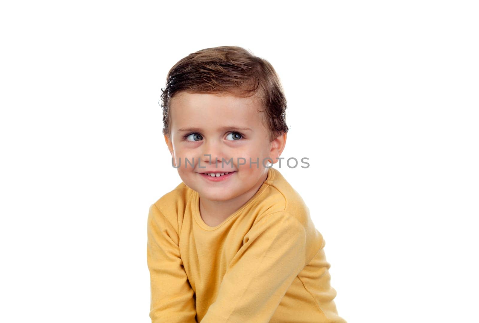 Shy small child two years old isolated on a white background