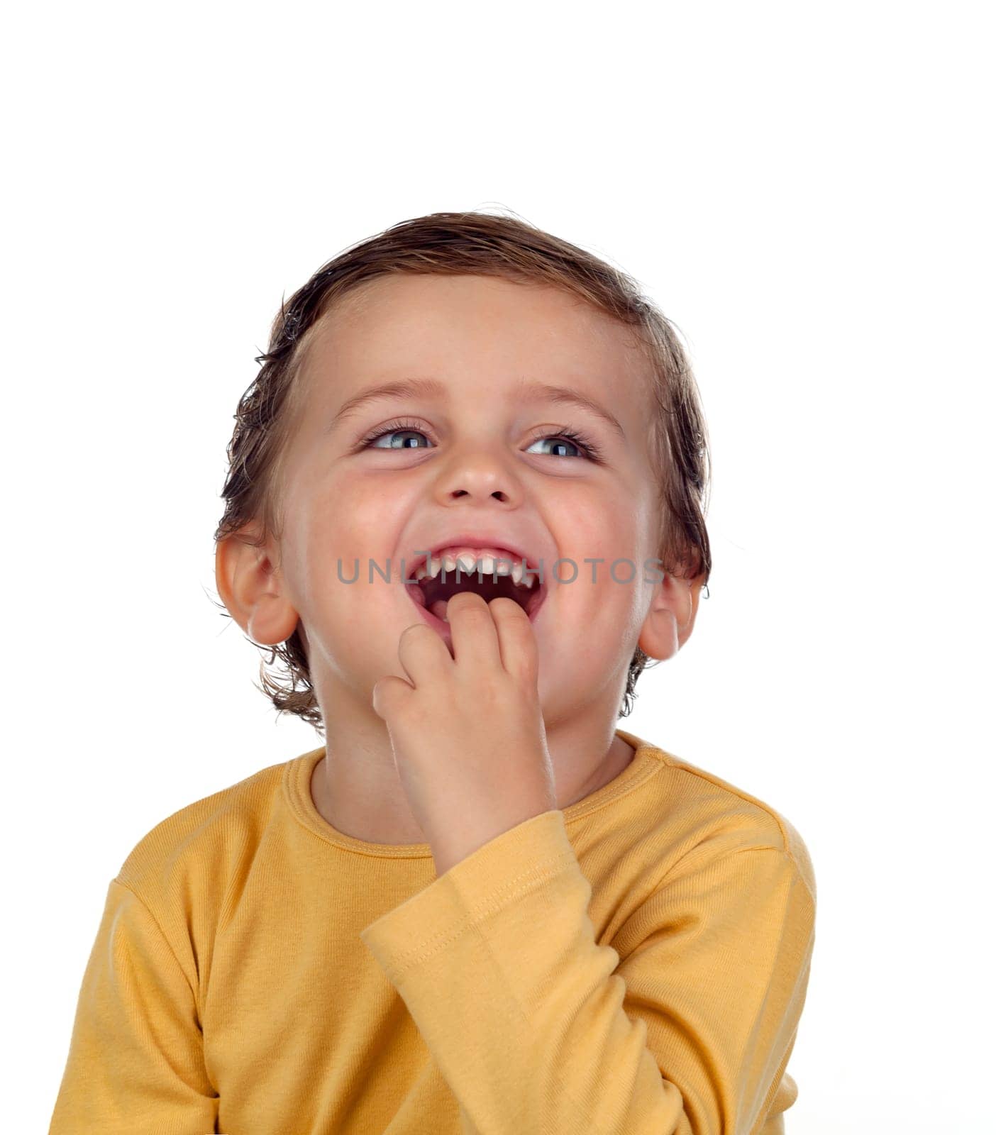 Adorable small child two years old sucking his hand
