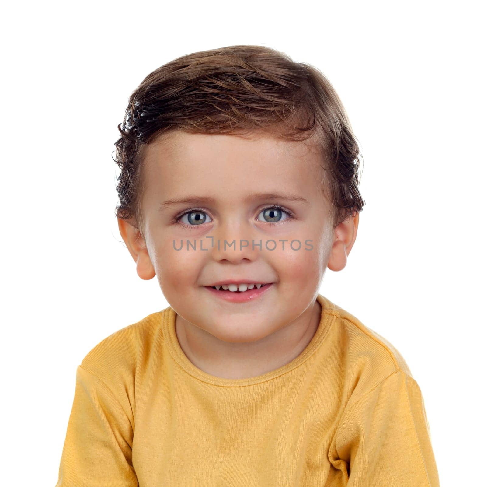 Adorable small child two years old with yellow t-shirt isolated on a white background