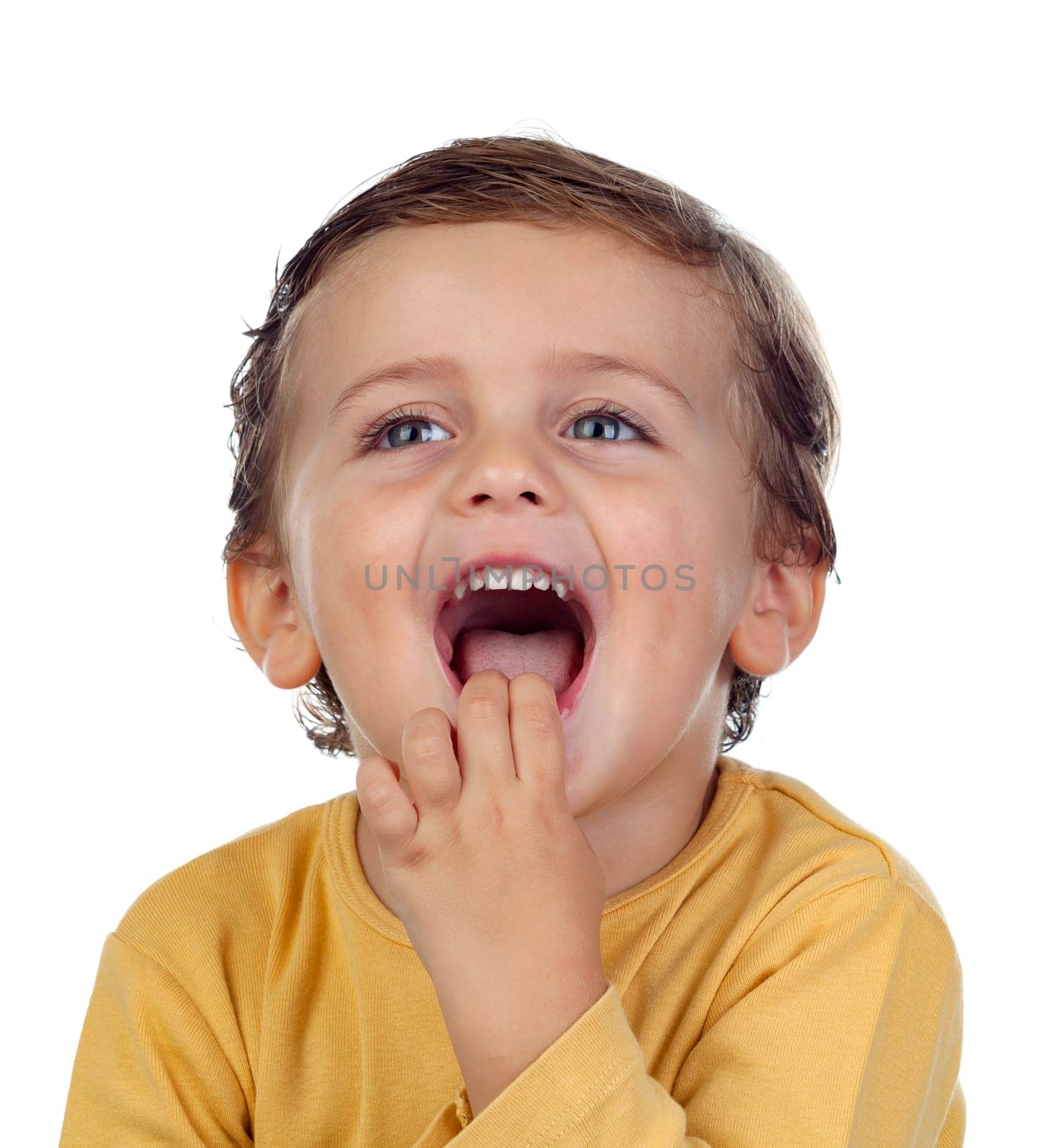 Adorable small child two years old sucking his hand