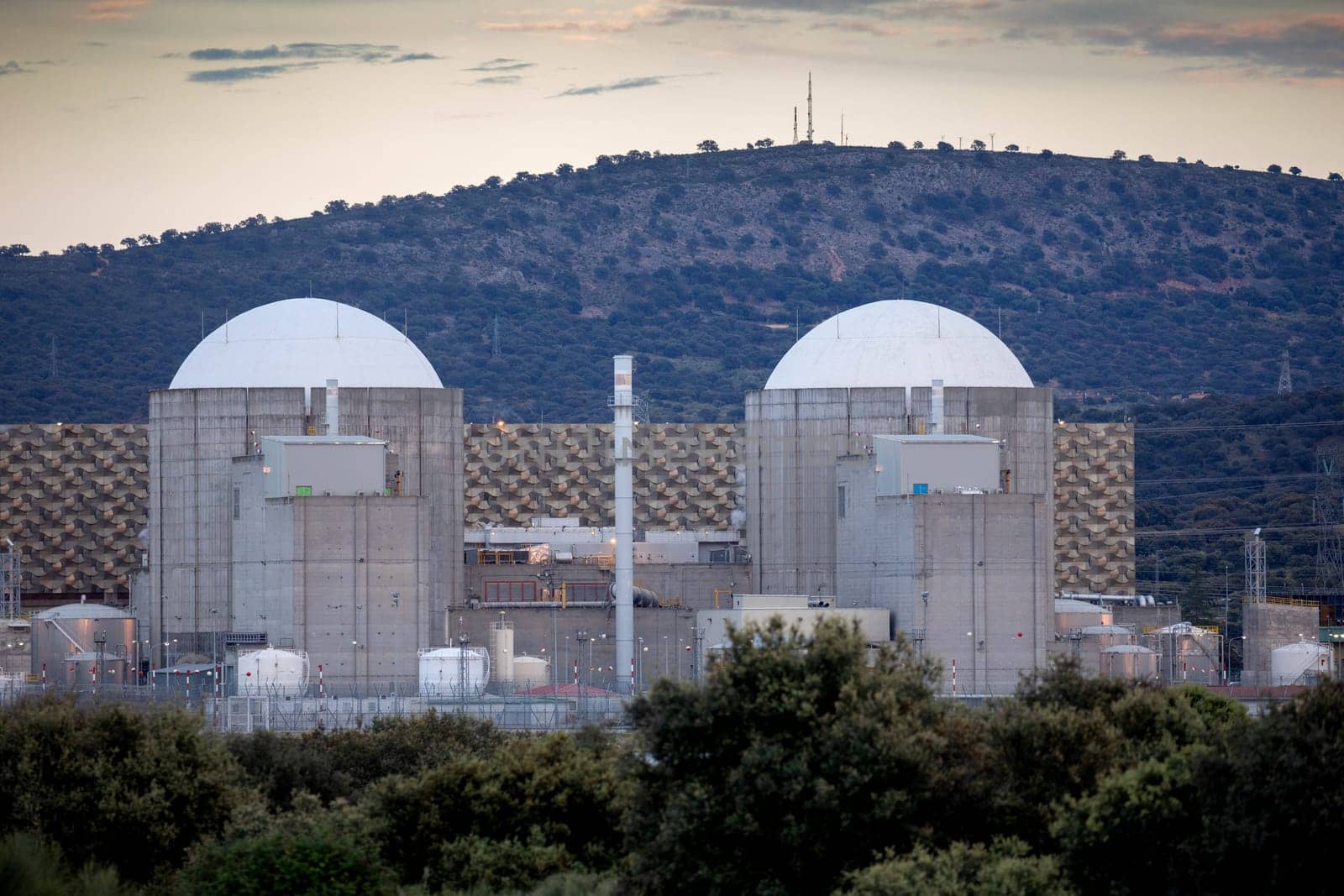 Almaraz, nuclear power plant in the center of Spain, surrounded by a green field