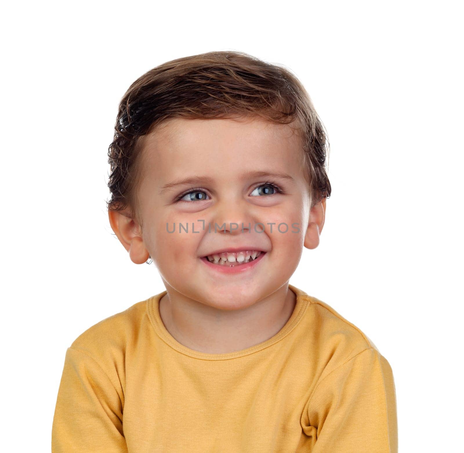 Adorable small child two years old with yellow t-shirt isolated on a white background