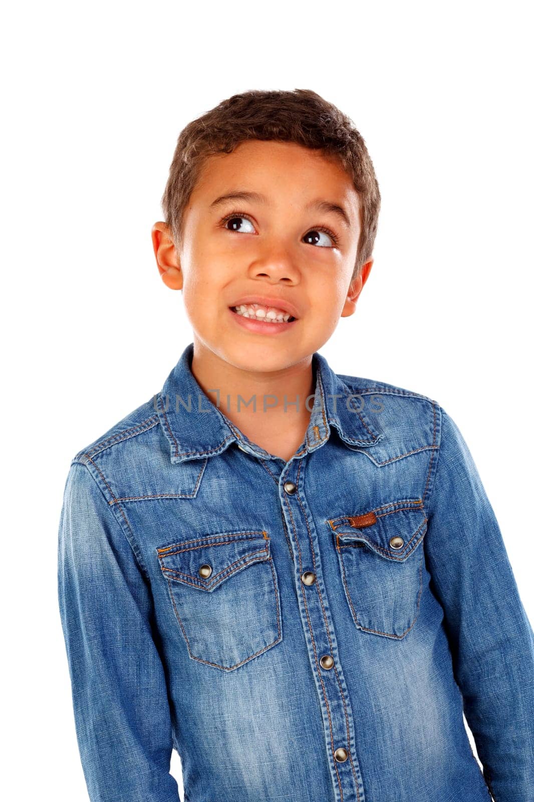 Funny small child with dark hair and black eyes crossing his arms isolated on a white background