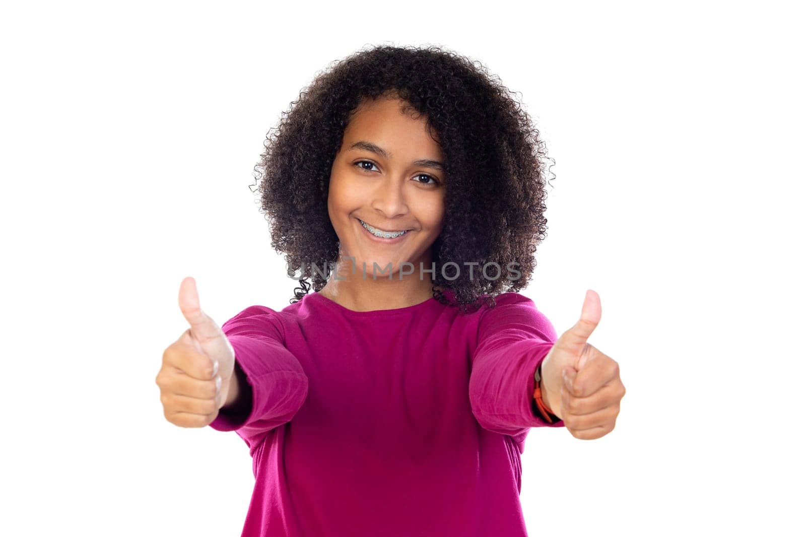Beautiful teenager girl with pink sweater isolated on a white background