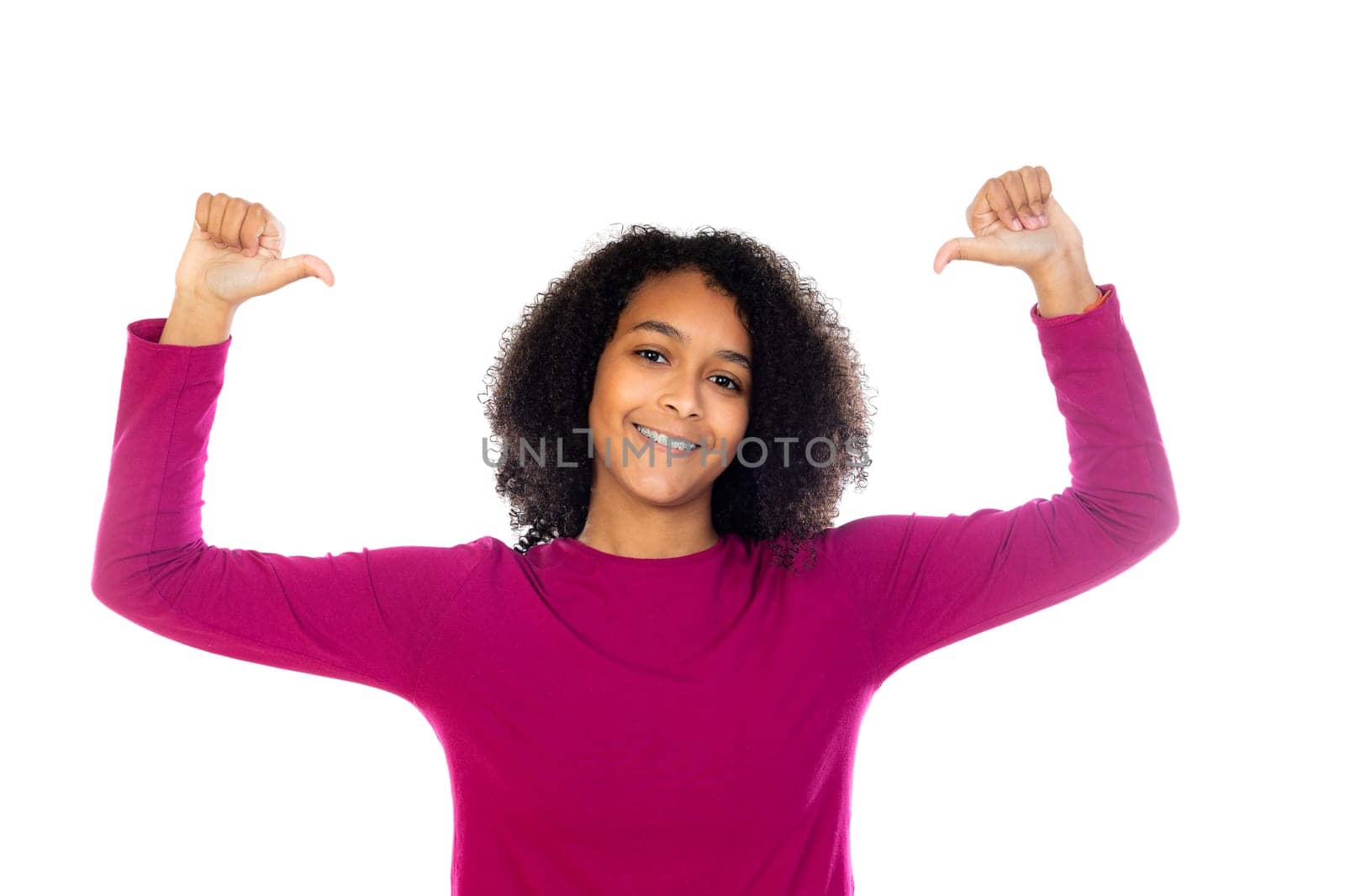 Beautiful teenager girl with pink sweater isolated on a white background
