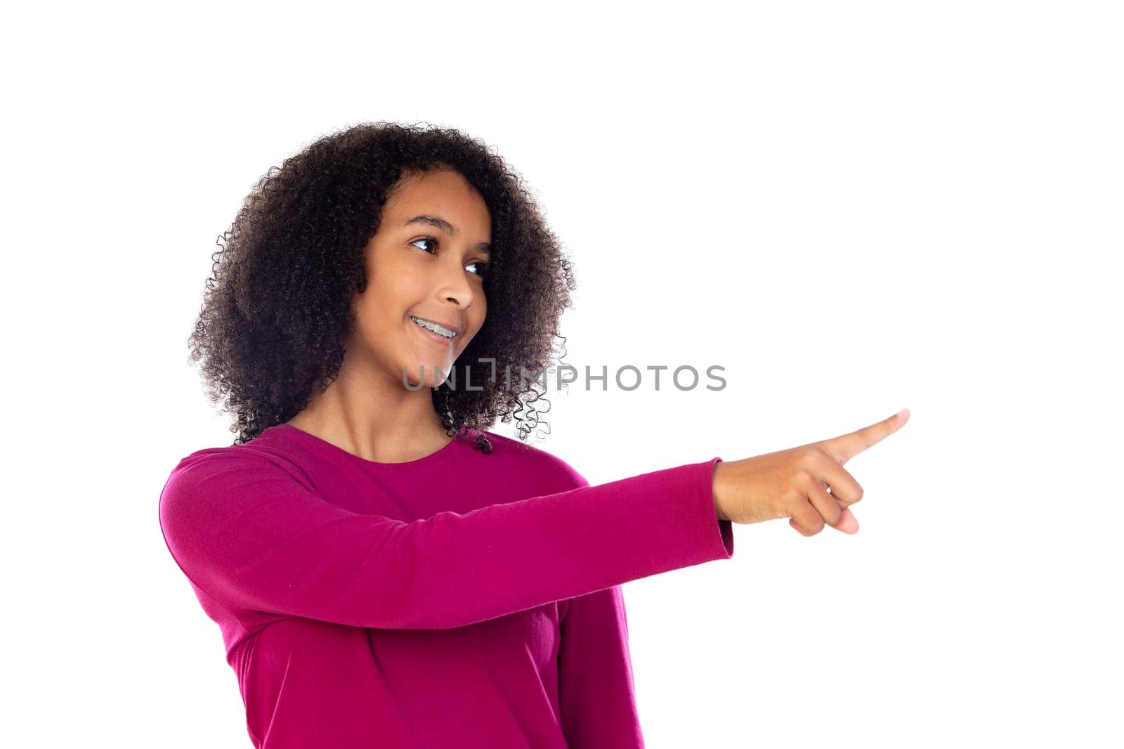 Beautiful teenager girl with pink sweater isolated on a white background