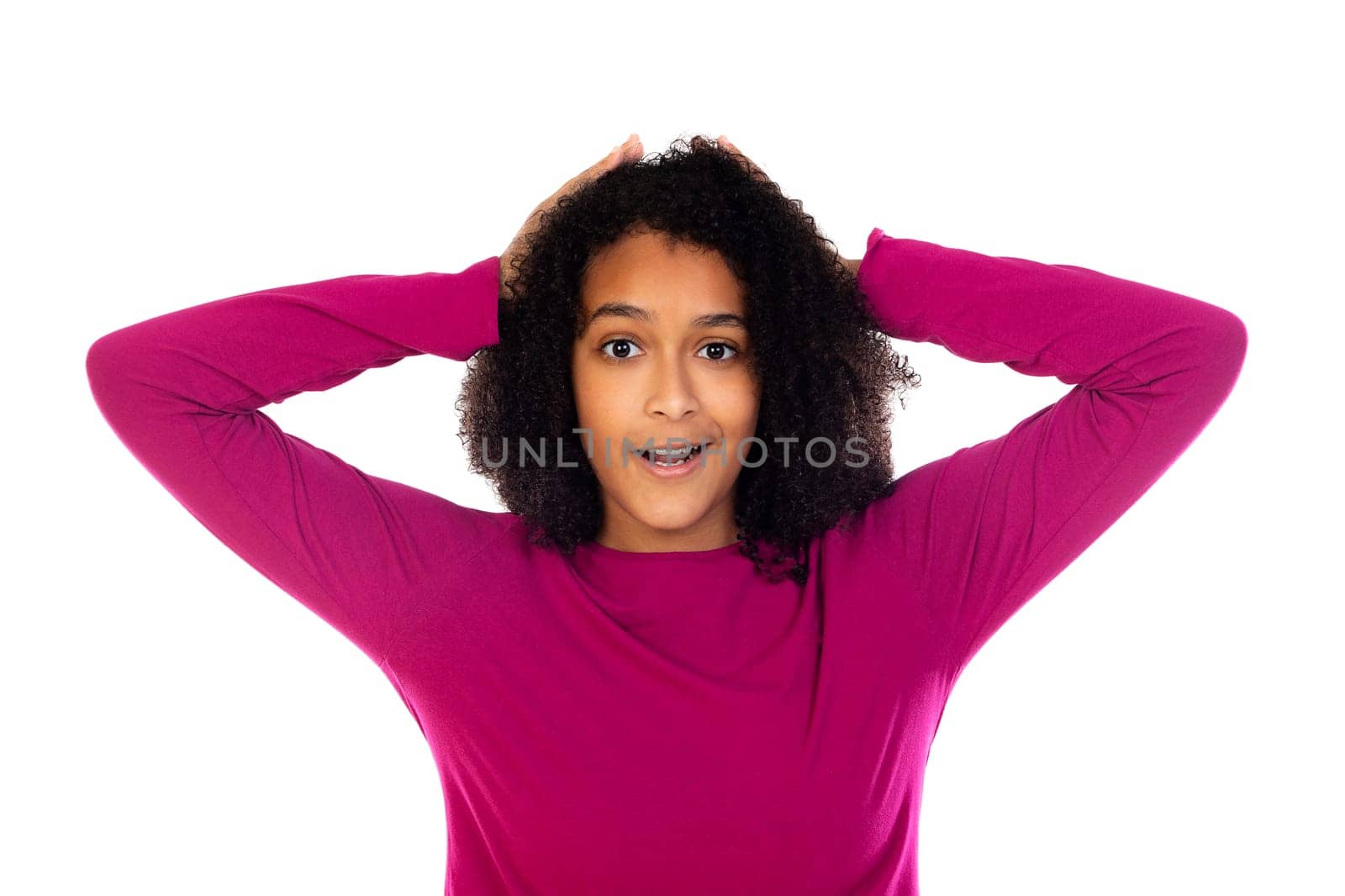 Teenager girl with afro hair wearing pink sweater isolated on a white background