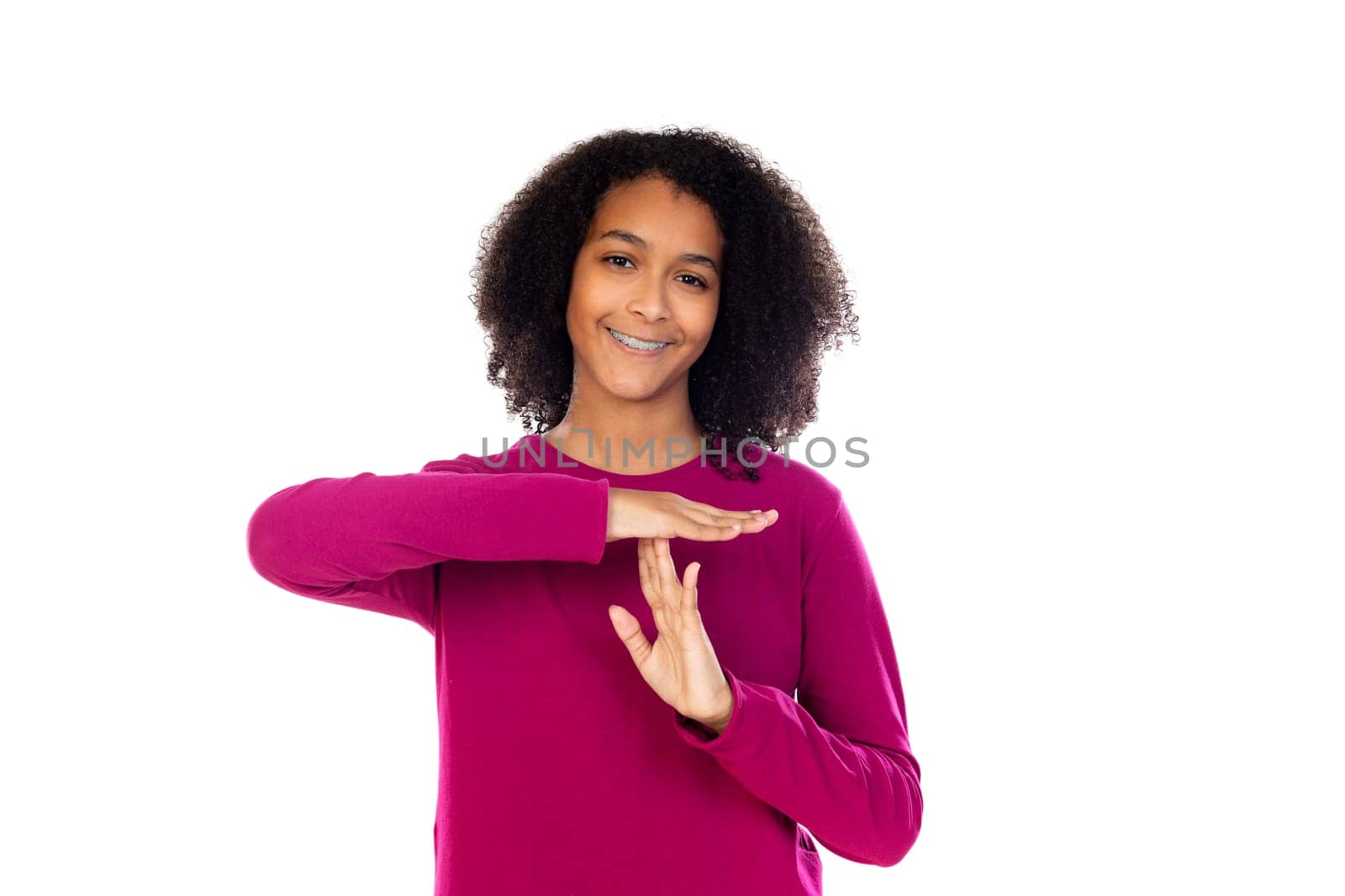 Portait of a teenage with afro hair isolated on a white background