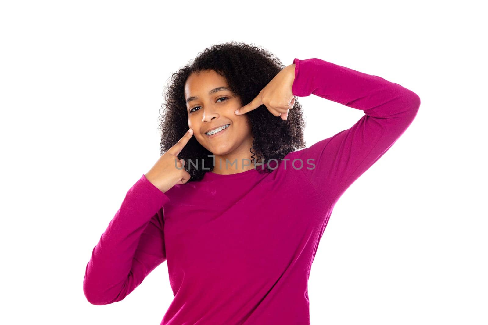 Beautiful teenager girl with dental braces isolated on a white background