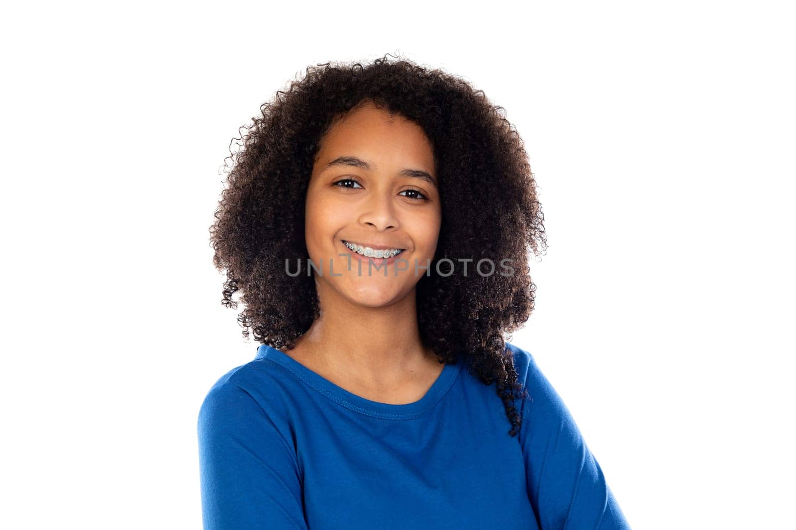 Teenager girl with afro hair wearing blue sweater isolated on a white background