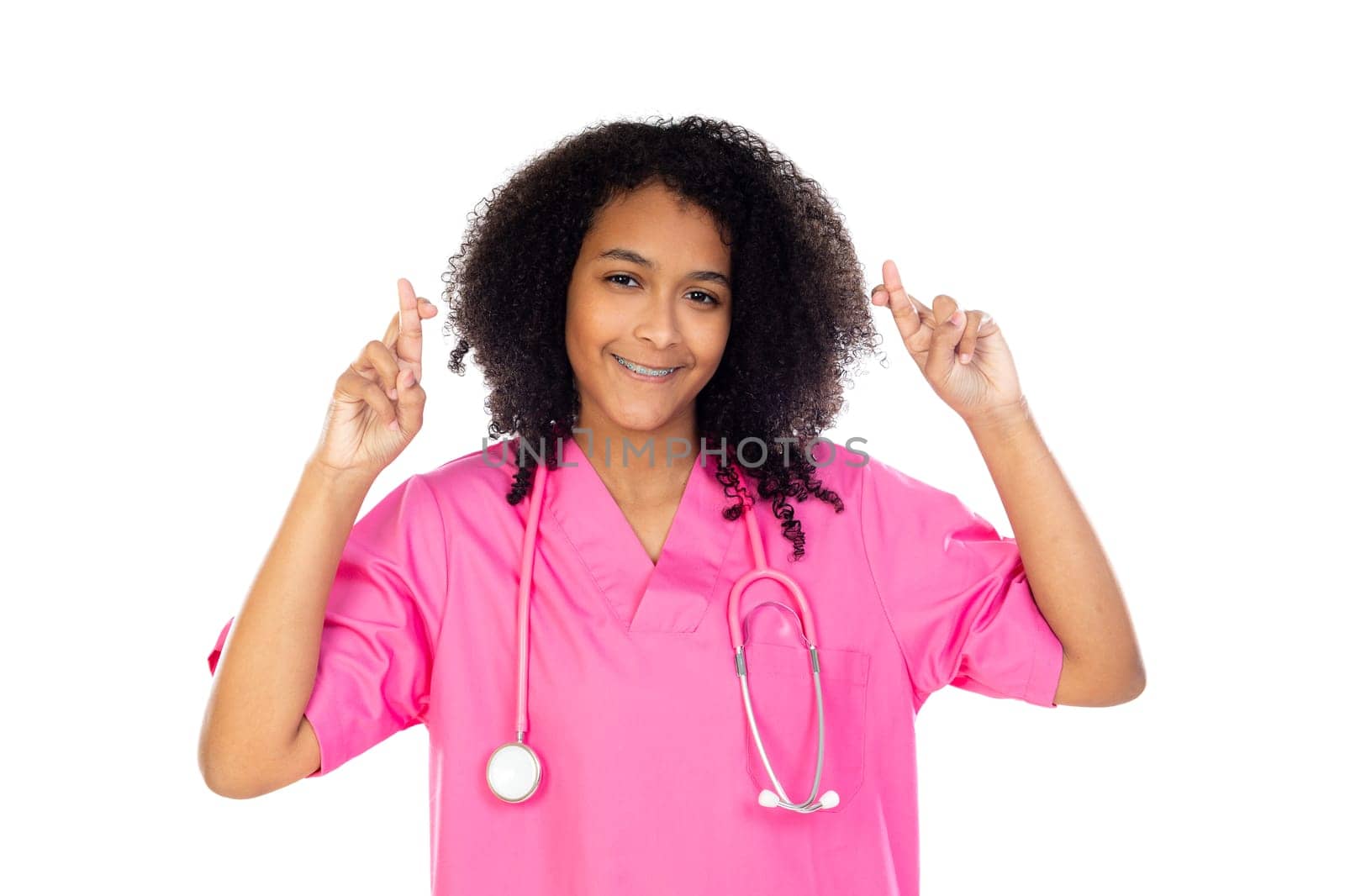 Adorable little doctor with pink uniform isolated on a white background