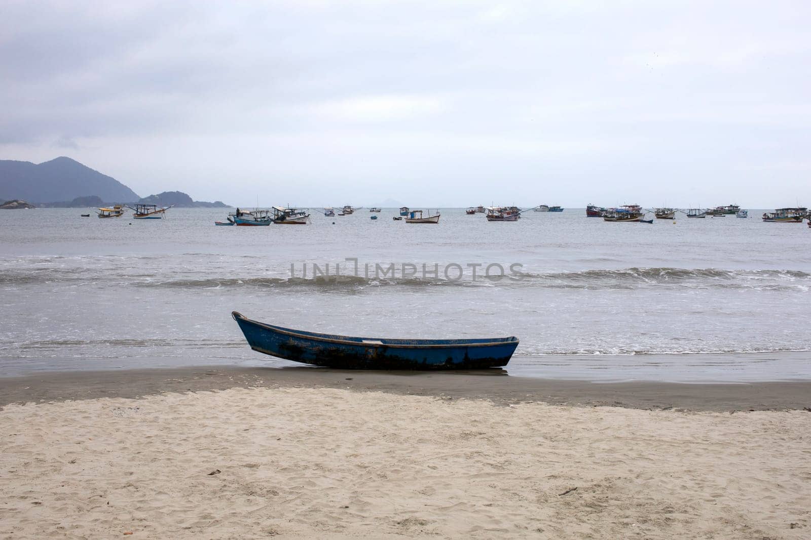 fishing boat ocean waves beach Brazil