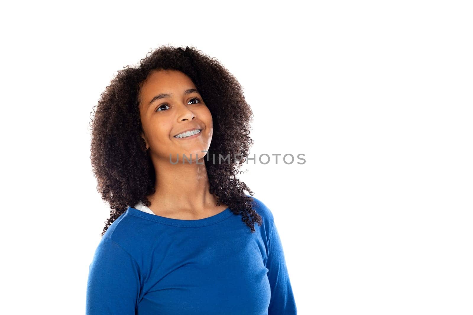 Teenager girl with afro hair wearing blue sweater isolated on a white background