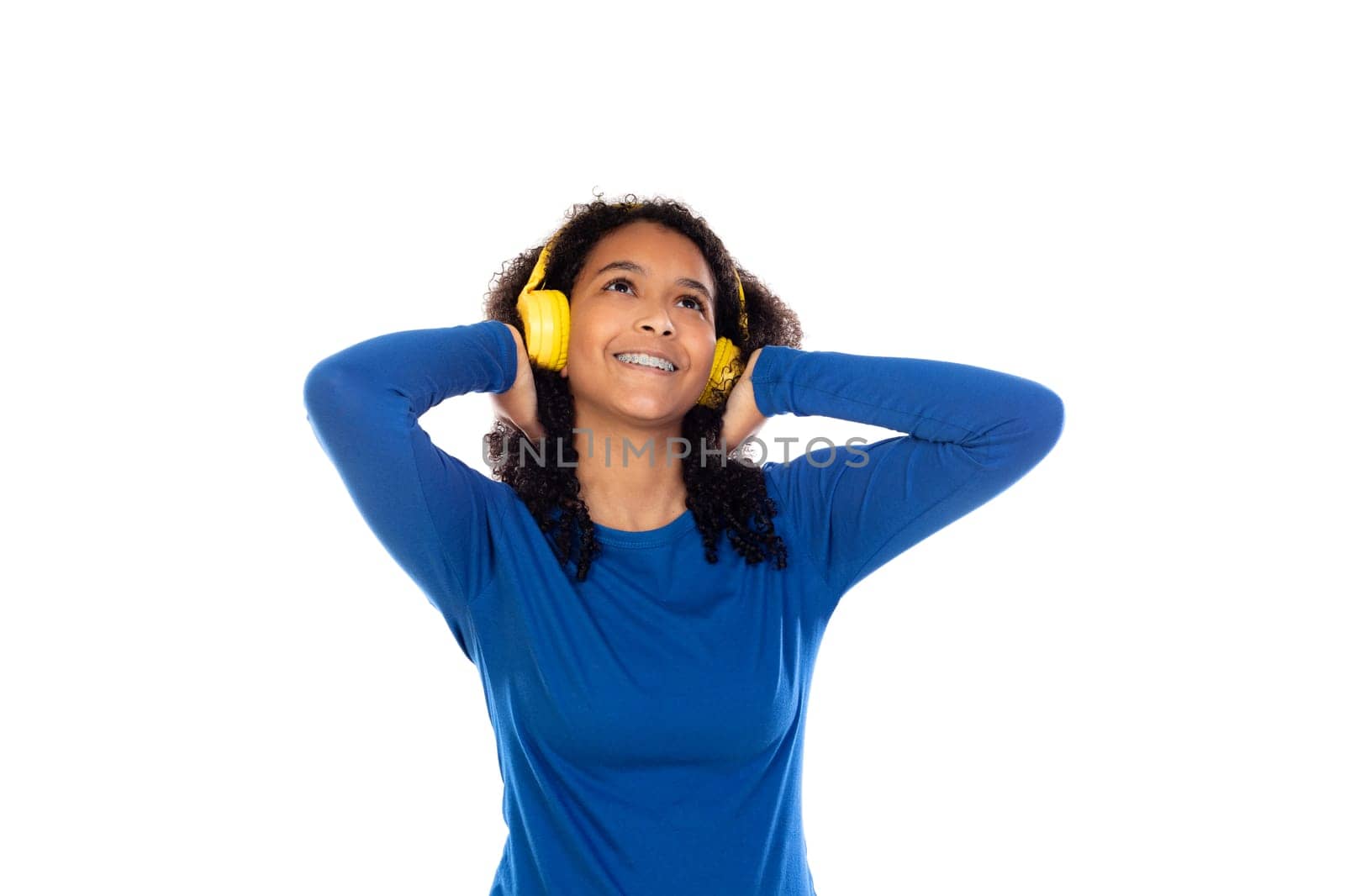 Teenager girl wearing blue sweater isolated on a white background