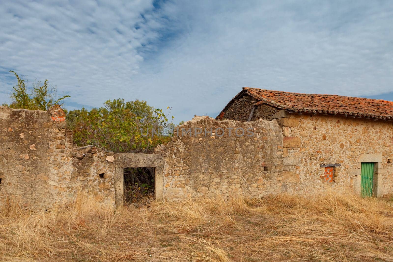 Ruined houses in the middle of the field