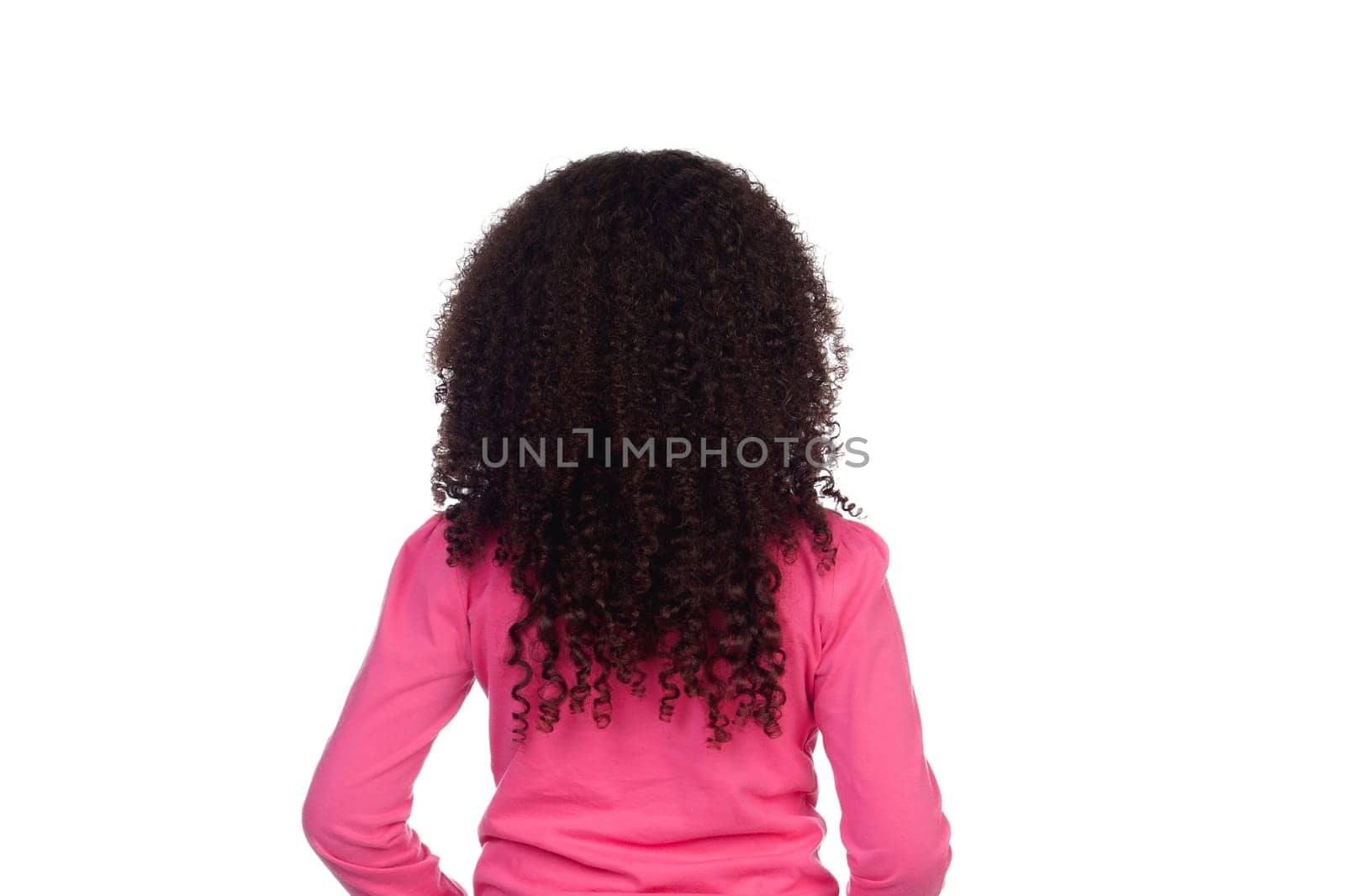 Back of a small girl with afro long hair isolated on a white background