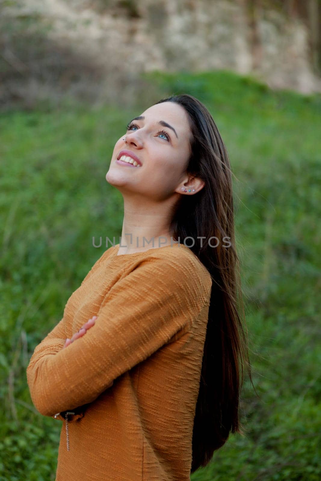 Outdoor portrait of beautiful happy teenager girl