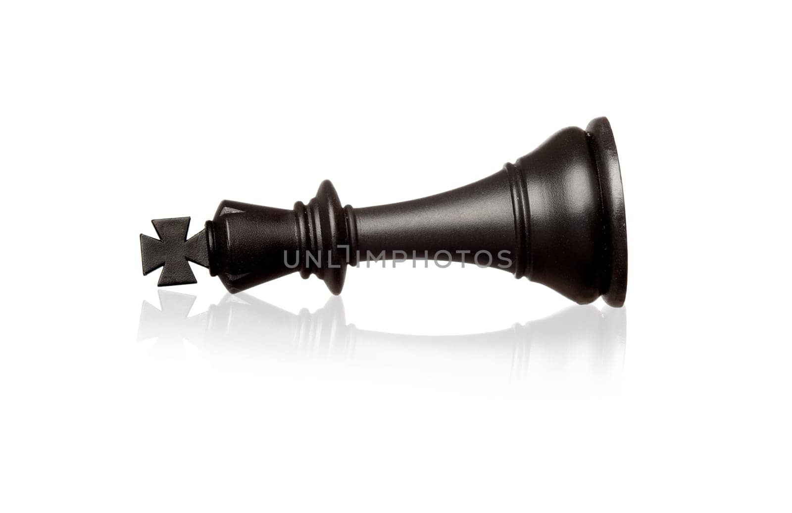 Chess piece king falling isolated on a white background