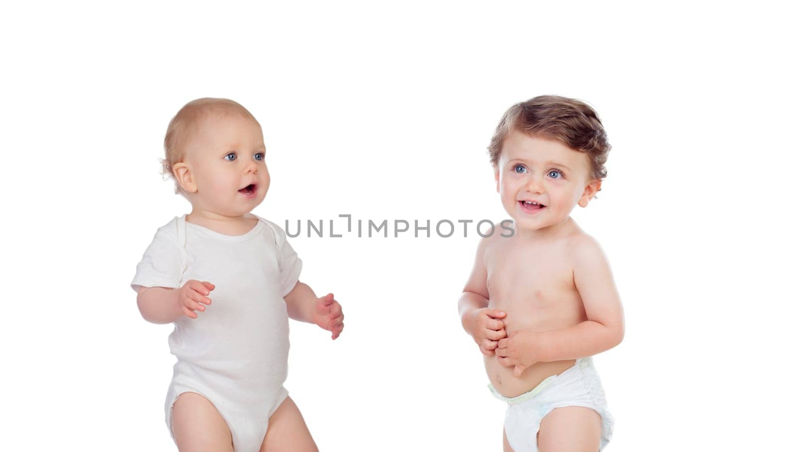 Two happy babies isolated on a white background