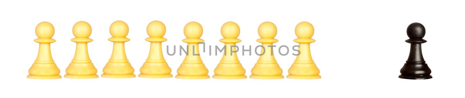Many pawns yellow and other one black isolated on a white background