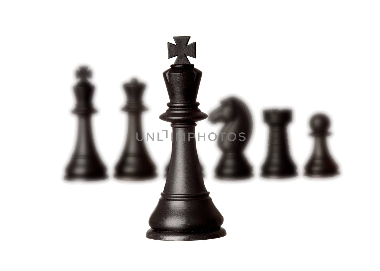 Black chess team with the king close-up isolated on a white background