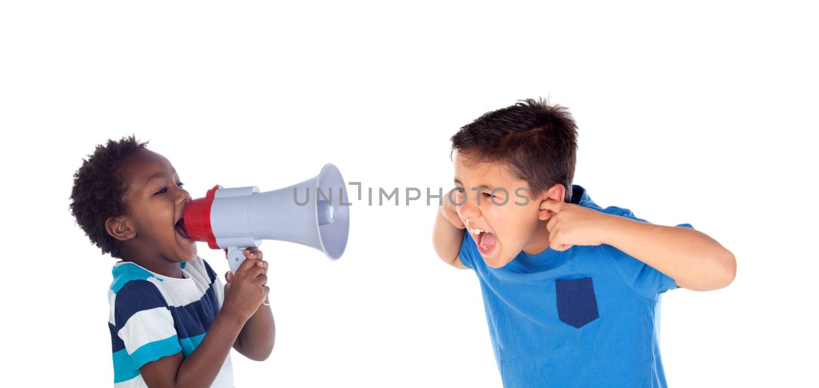 Funny little boy shouting through a megaphone to his friend. Isolated on white background