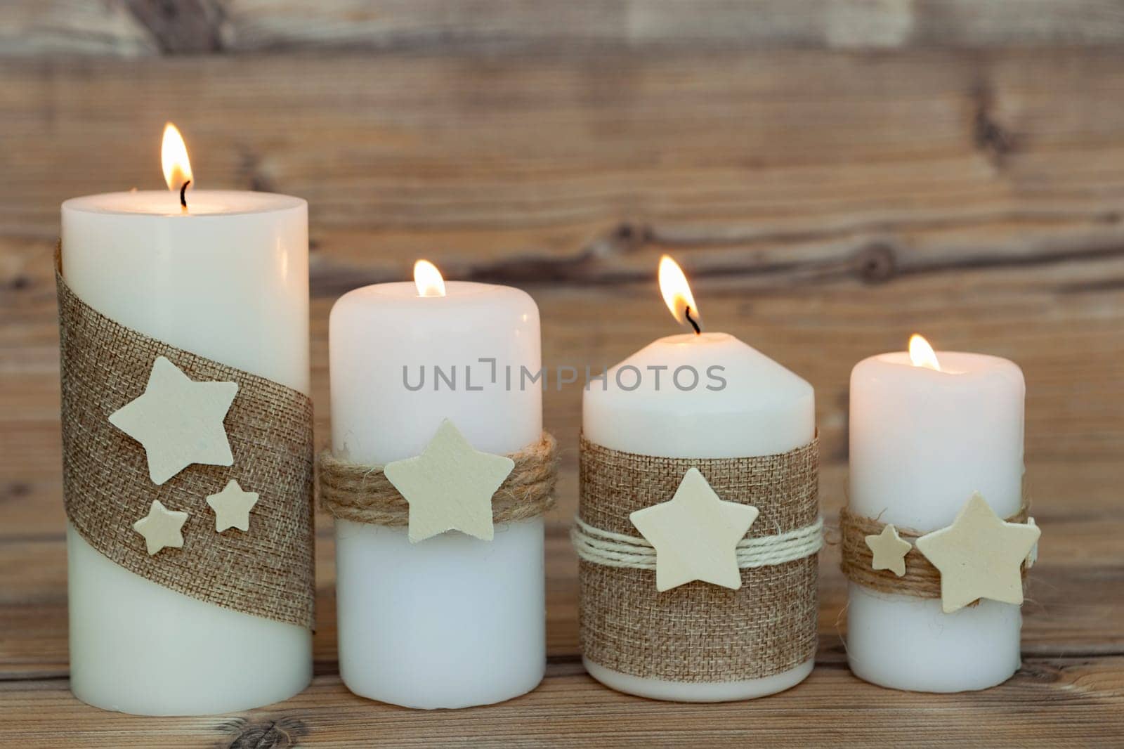 Beautiful Candles in home. Warm christmas decoration