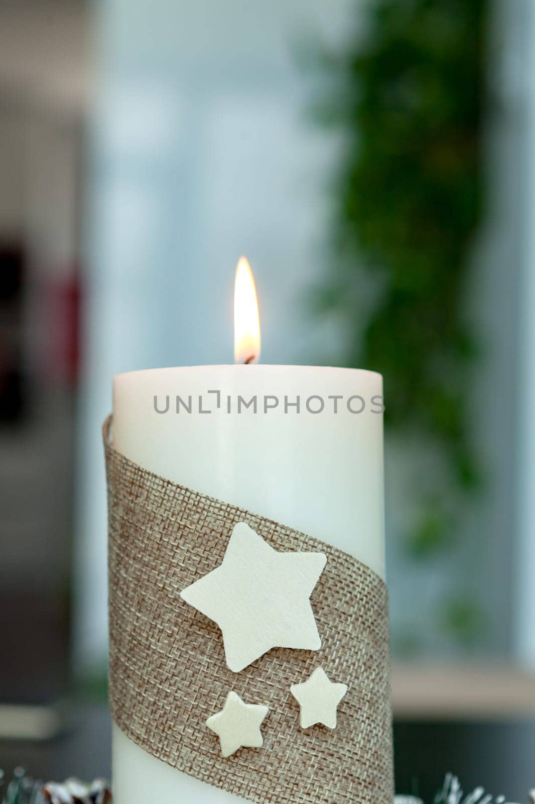 Beautiful Candles in home. Warm christmas decoration