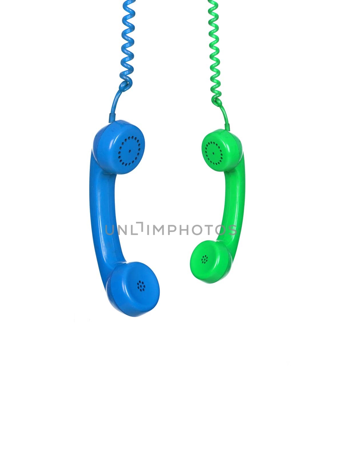 Blue and green phones hanging from a cable isolated on a white background