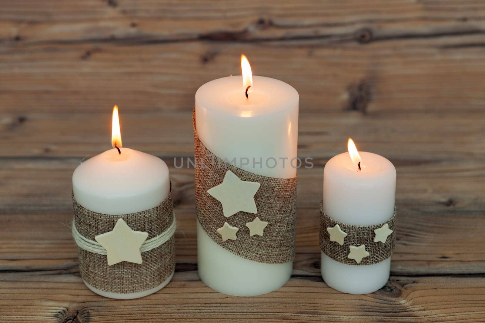 Beautiful Candles in home. Warm christmas decoration