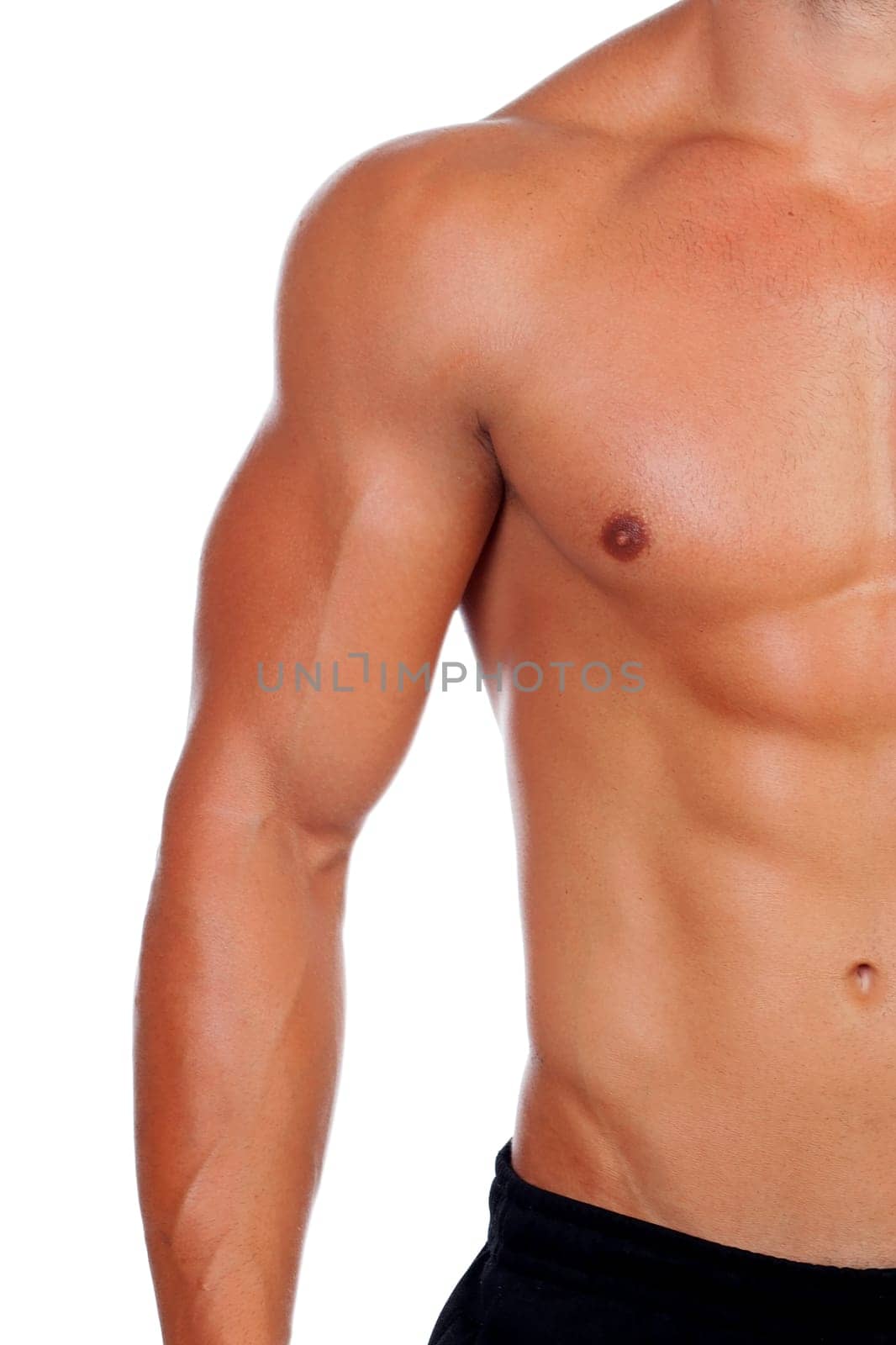 Attractive male body showing his muscles isolated on a white background