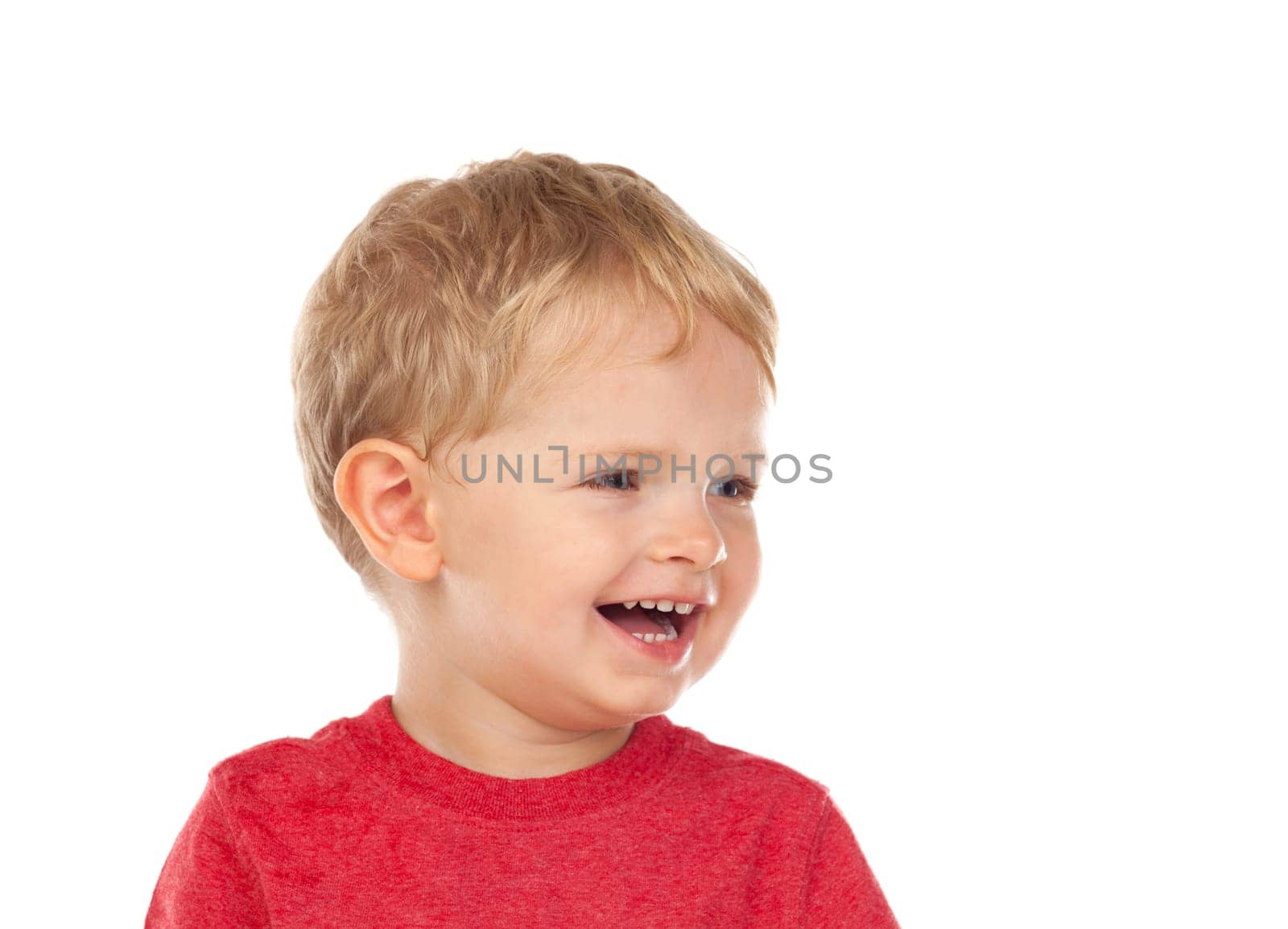Beautiful little child two years old laughing isolated on a white background